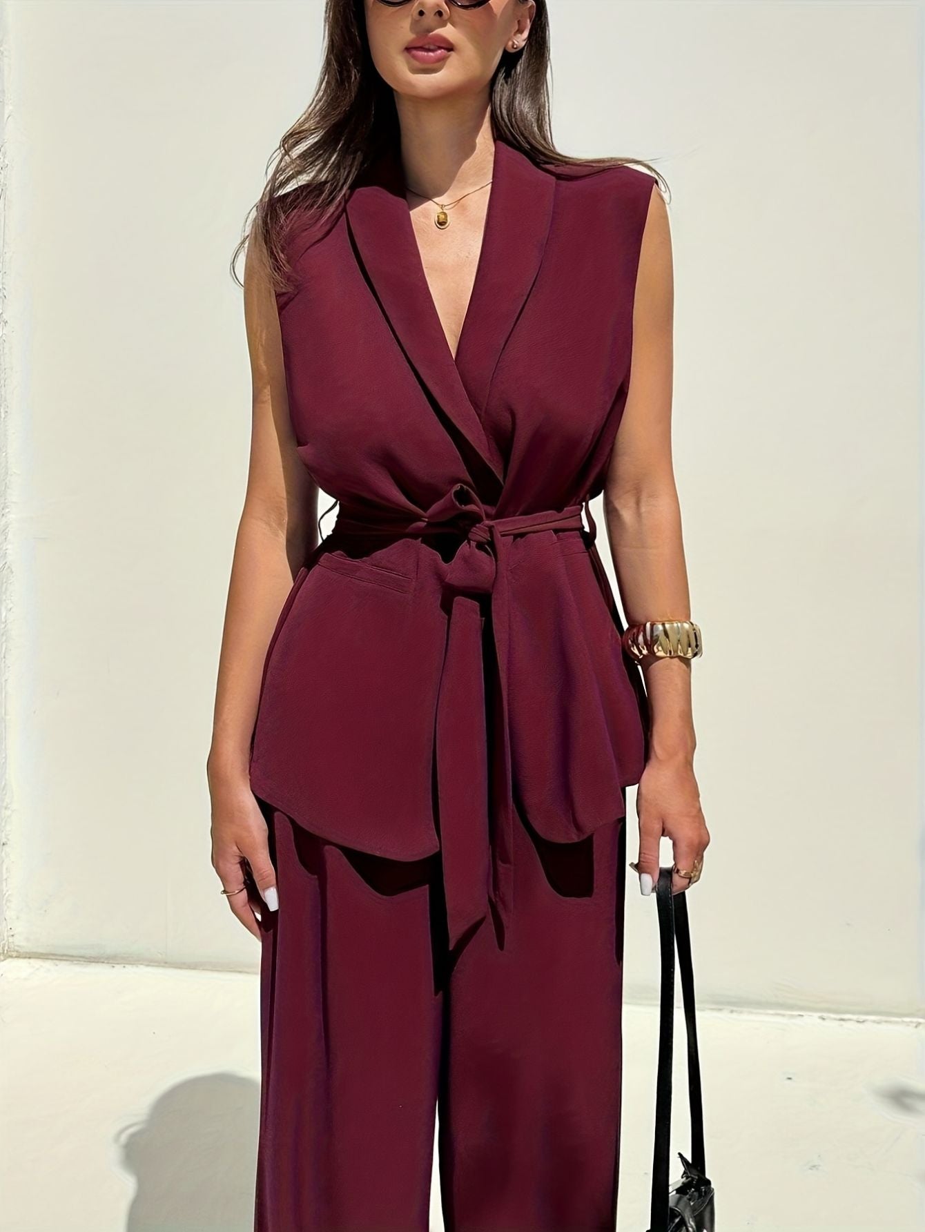 Dames mouwloze getailleerde vest en broek set