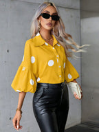 Dames blouse met puffmouwen – grote stippen