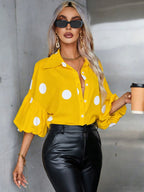 Dames blouse met puffmouwen – grote stippen