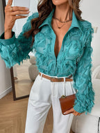 Dames blouse met franjes en kantborduurwerk