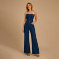 Dames strapless jumpsuit met knoopsluiting en flare pijpen