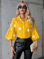 Dames blouse met puffmouwen – grote stippen