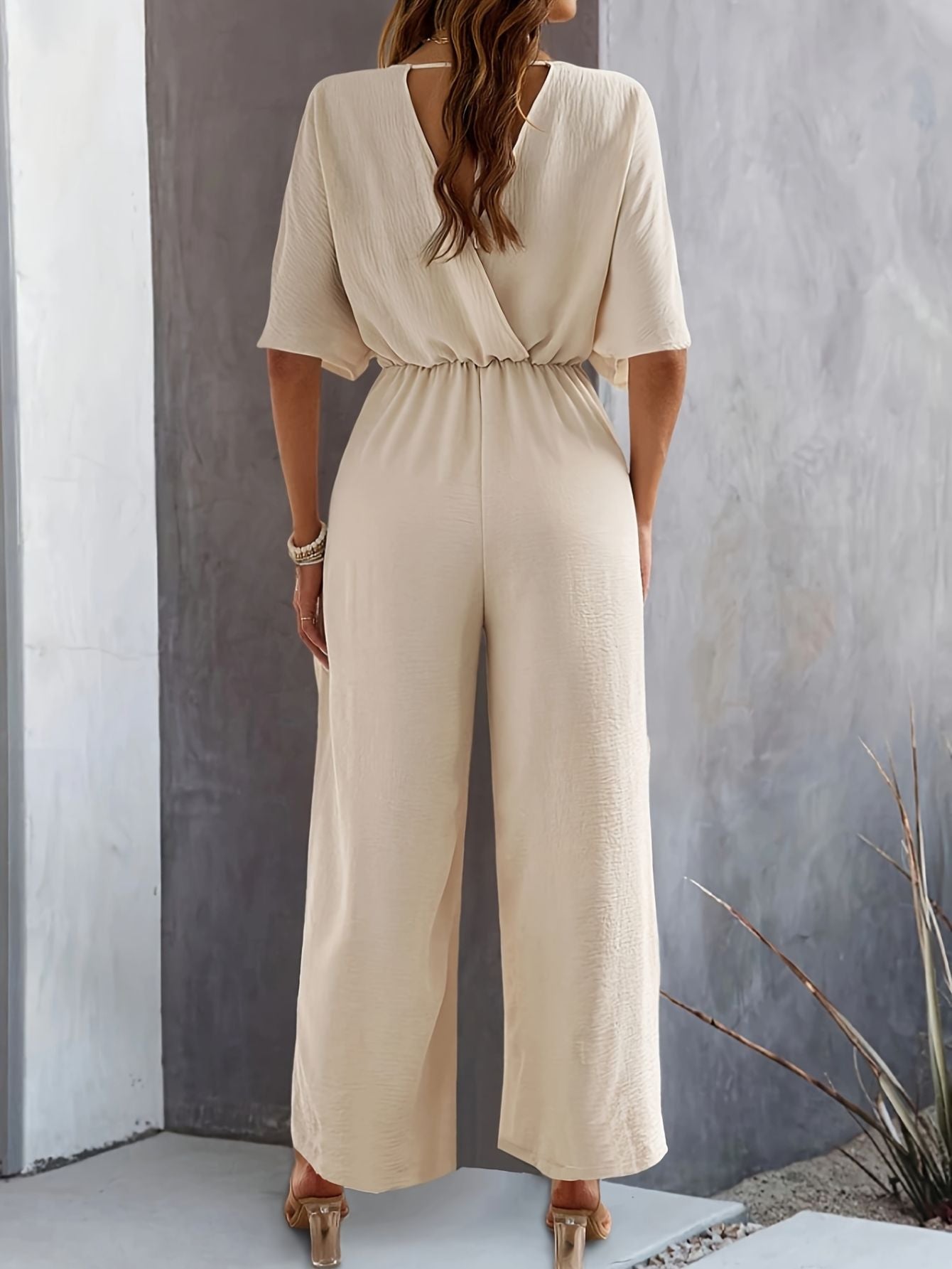 Dames v-hals wijde pijpen jumpsuit