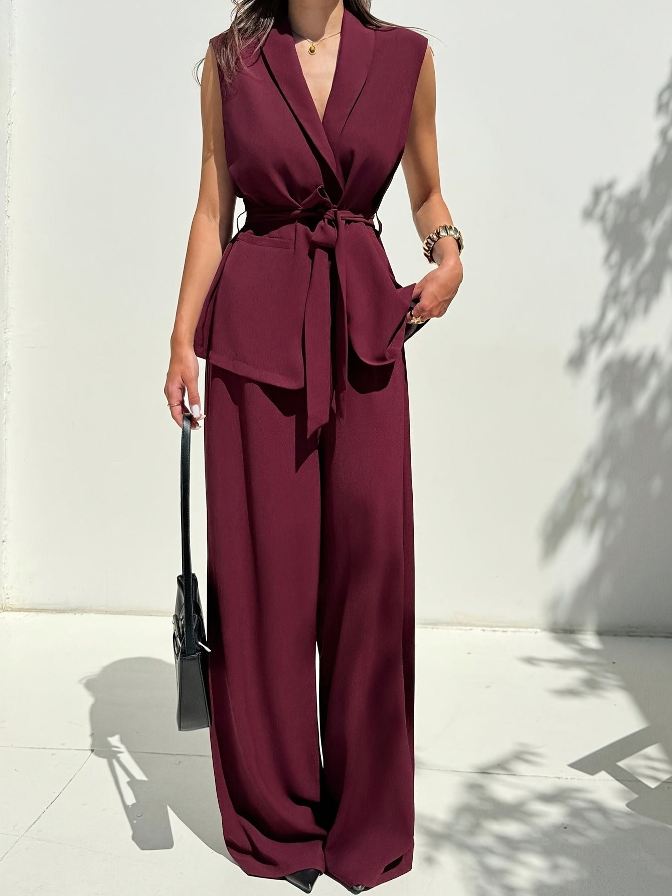 Dames mouwloze getailleerde vest en broek set