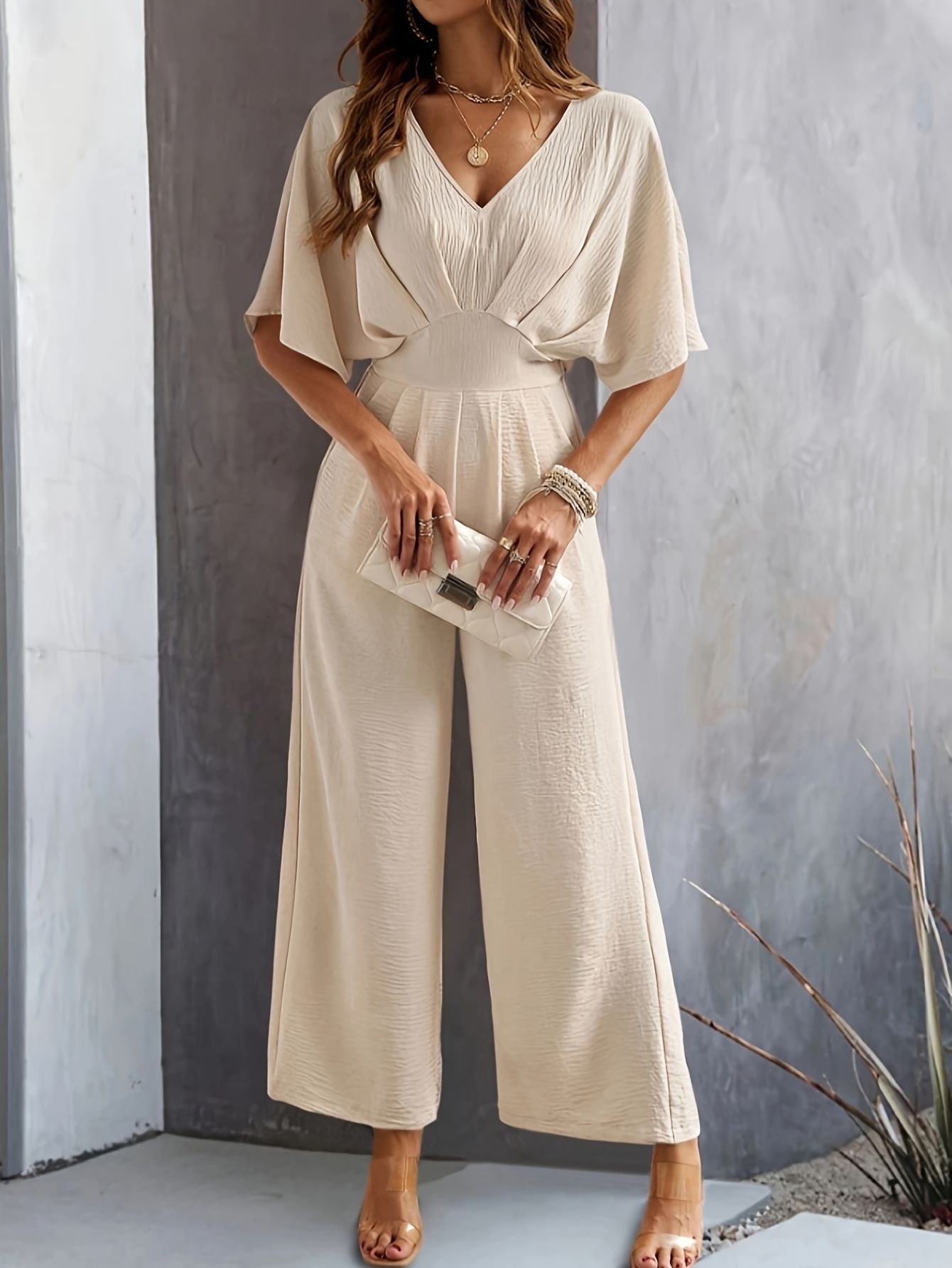Dames v-hals wijde pijpen jumpsuit